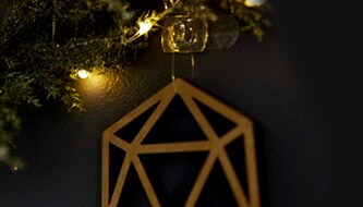 Christmas decorations hanging on wall with Command™ clear hook

