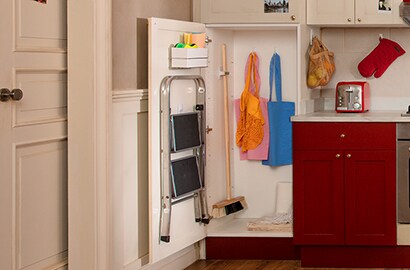 Organising inside kitchen cupboard with Command™ solutions