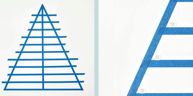 ScotchBlue™ tape on wall with Command™ clear hooks
